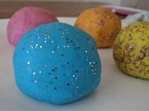 Homemade playdough with blue and silver glitter
